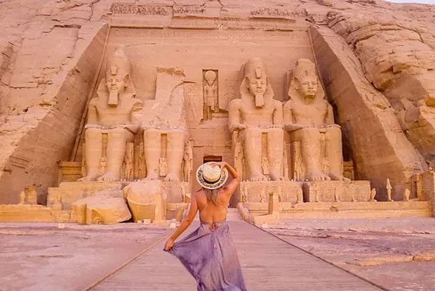 The four colossal statues guarding the entrance are the largest surviving sculptures from ancient Egypt.