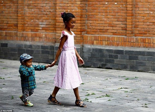 Khapangi suffers from a rare disease that halted his growth at an early age.