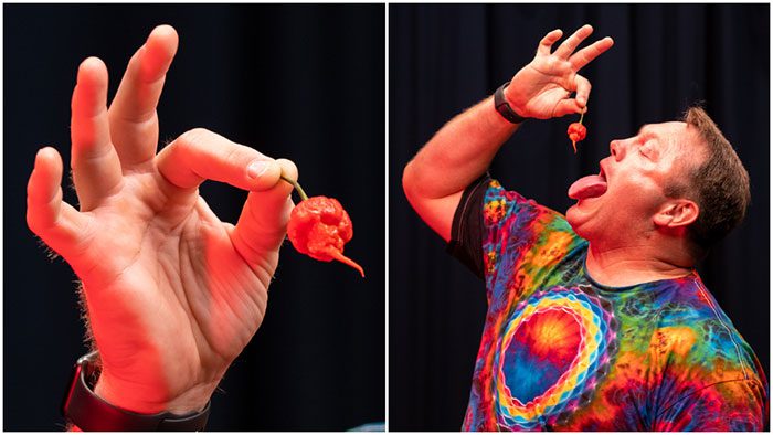 Gregory Foster sets a record by eating 10 Carolina Reaper peppers.