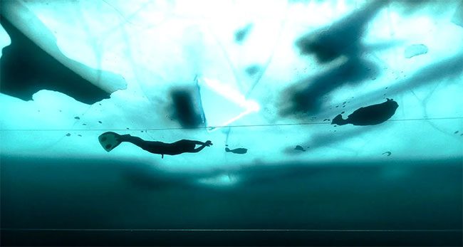 Arthur Guerin-Boeri sets a record for swimming in cold water at 0.7 degrees Celsius.