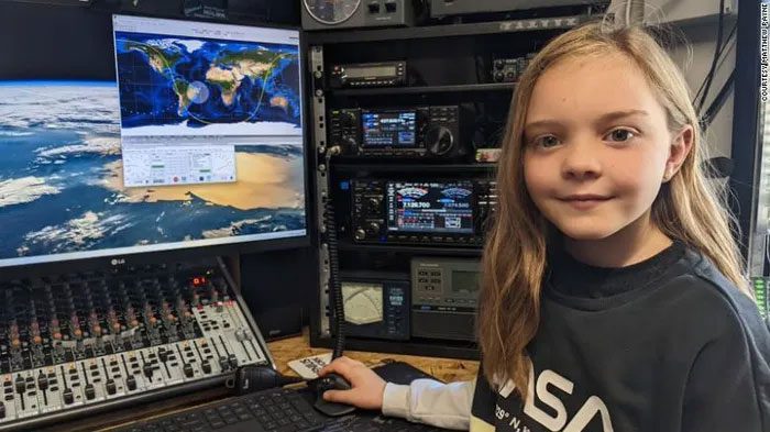 Isabella Payne with her amateur radio system at home