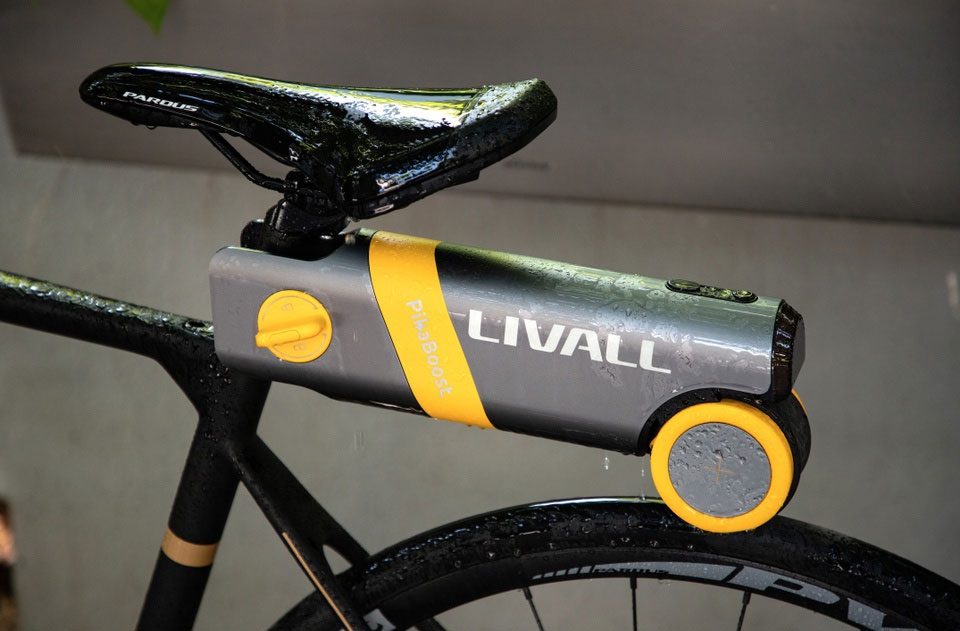 The product is directly attached to the rear wheel of the user's bicycle.