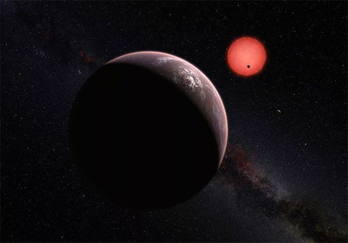 Graphic depiction of the newly discovered planet and the red dwarf star nurturing it.