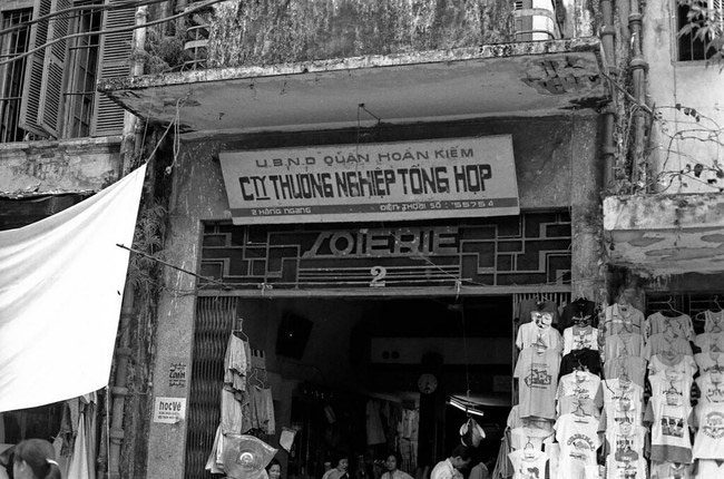 Store number 2 on Hang Ngang. The gate has the word "Soierie," which means "Silk" in French.
