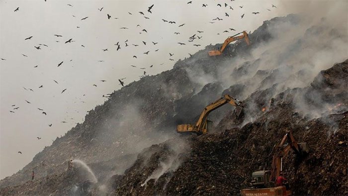 The Ghazipur landfill burning in Delhi, India.