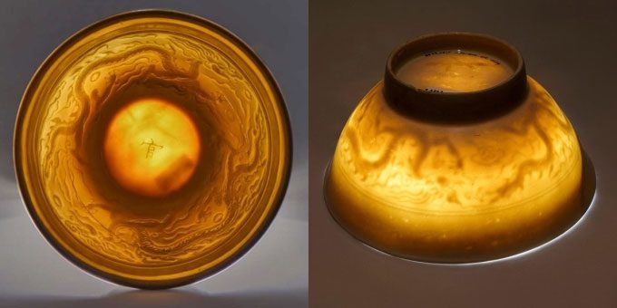 Dragon patterns are clearly visible when the bowl is illuminated.