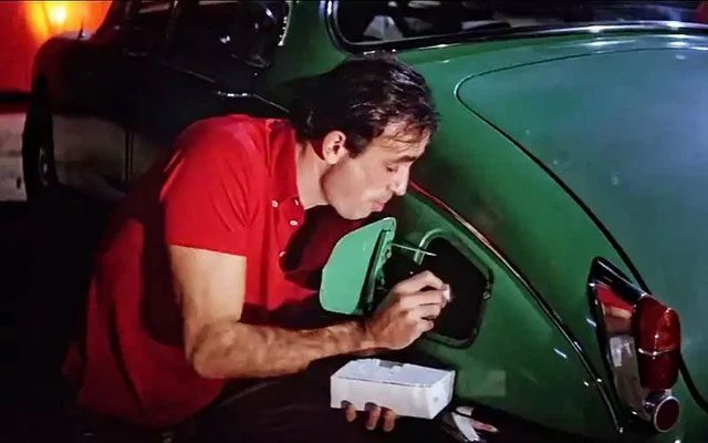 Pouring sugar into a car's gas tank as a prank