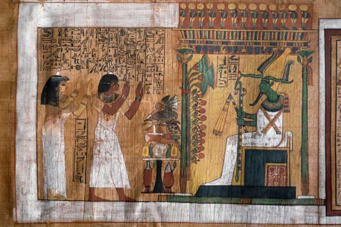 A painting in the tomb depicting Kha and Merit worshipping the god of the afterlife, Osiris