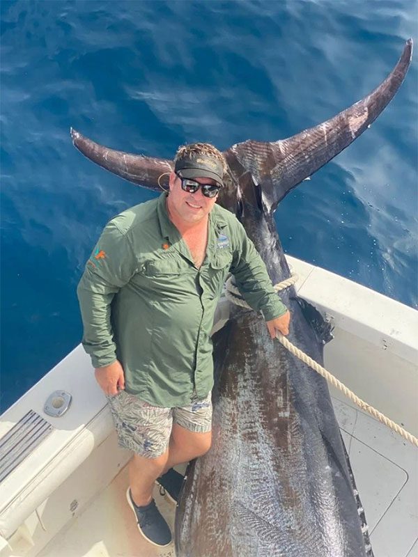 The nearly 1-meter wide tail fin of the giant blue marlin.