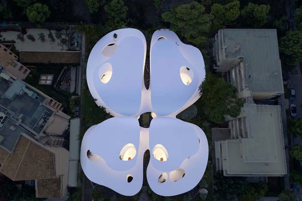 From above, the house resembles a butterfly spreading its wings