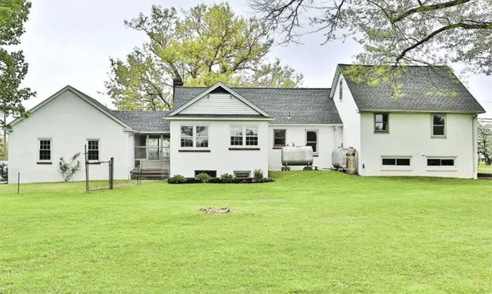 From the outside, the white-painted house looks quite spacious and well-kept, with nothing unusual.