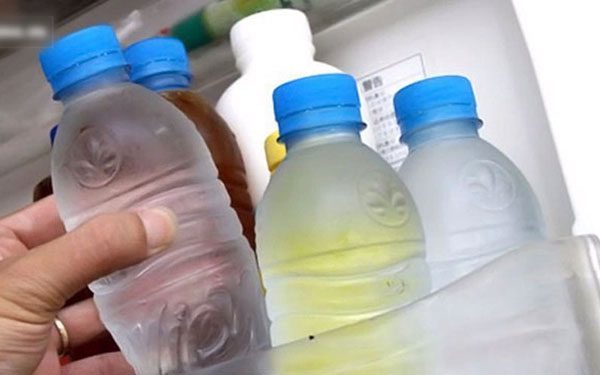 Plastic water bottle in refrigerator