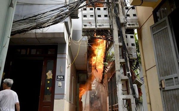 A fire occurs in a deep alley.