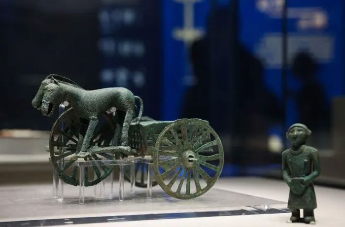 The three-wheeled bronze chariot discovered at the Laolongtou tomb complex.