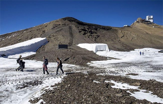 Hikers crossing the newly discovered path