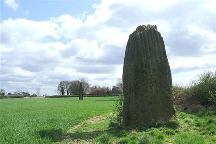 The Devil's Arrows with 3 upright stone columns, towering high.