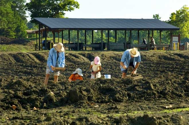 Visitors digging for diamonds at Crater of Diamonds.