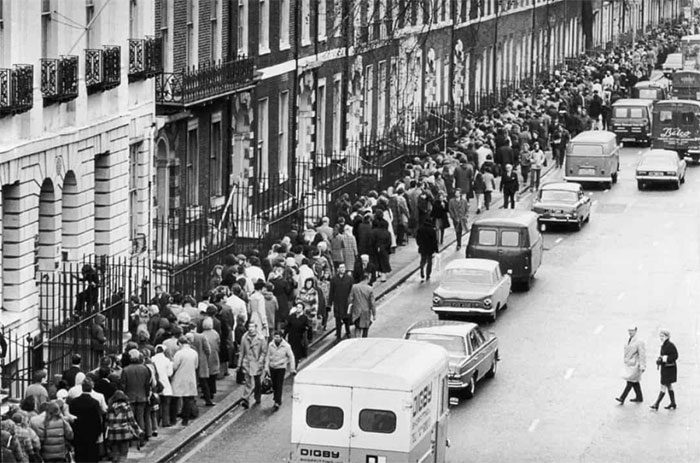 Long line of people in Bedford Square, London to view an exhibition