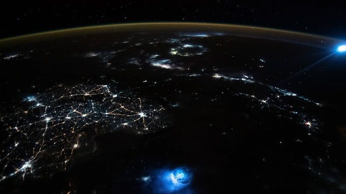 Two unusual blue spots glowing in Earth's atmosphere.