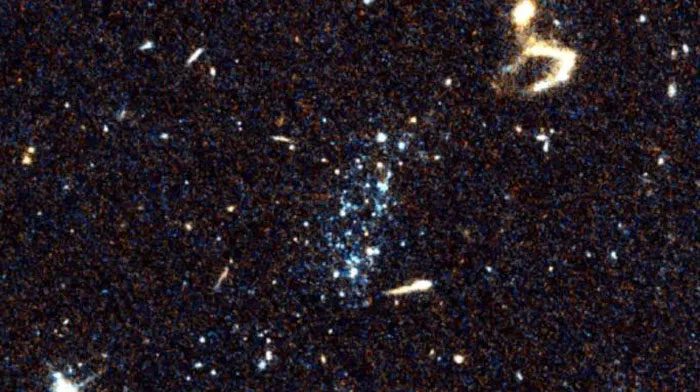 The strange blue spots in the sky, surrounded by smaller material spots