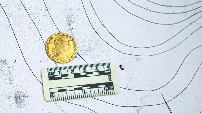 Gold guinea coin featuring a guinea pig design from 1766 by King George III