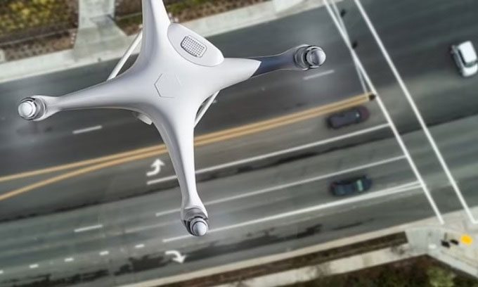 Sensors on the road help drones fly safely.