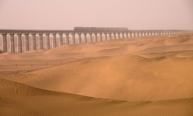 A test train runs on the Hotan-Ruoqiang line in Xinjiang Autonomous Region.