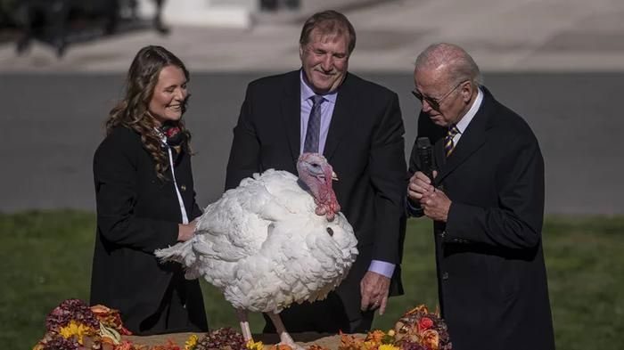 President Joe Biden pardoning a turkey