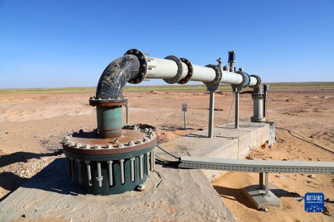 An operational water well on the sugar beet field.