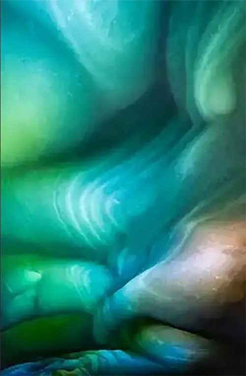 Light effects create stunning images in the ice cave.