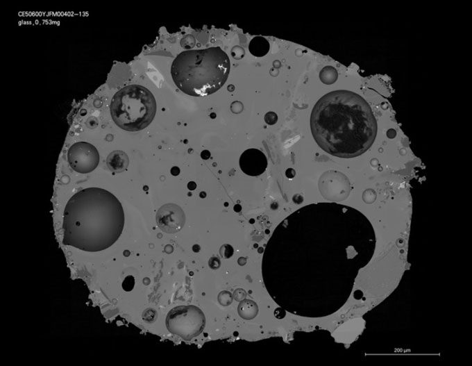 Cross-section of a glass particle in a lunar soil sample captured by an electron microscope.