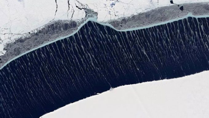 Beautiful ice ribbons forming on a water channel in the Ronne Ice Shelf