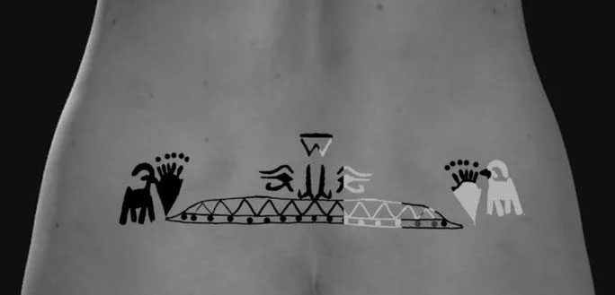 The tattoo of the second Egyptian girl depicts the tranquil banks of the Nile River