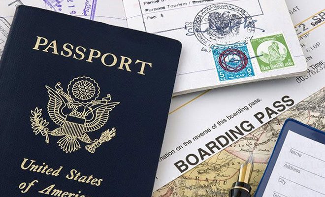 Both have dark-colored passports, but the "power" of the Syrian passport is much less than that of the U.S.