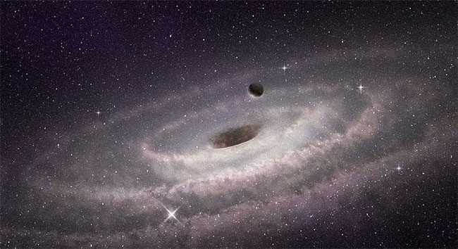 Supermassive black hole at the center of a spiral galaxy.