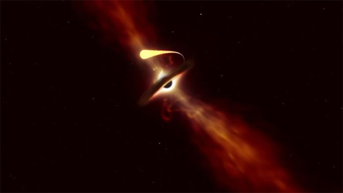 Image of a black hole destroying a star