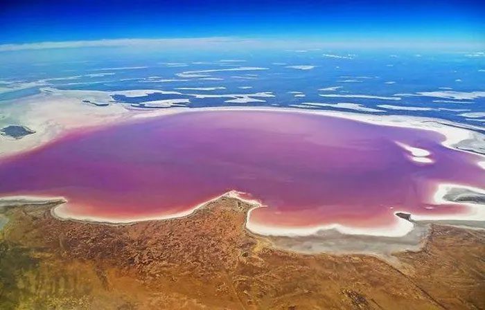 Rainwater mixes with salt and pink algae, turning the lake a beautiful pink color.