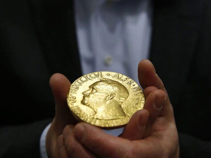 Nobel medals awarded to winning scientists.