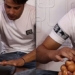 keep the month with 18 eggs on the hands of a man setting a world record 119143