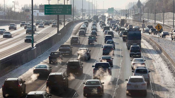 Automobile exhaust rising into the air.