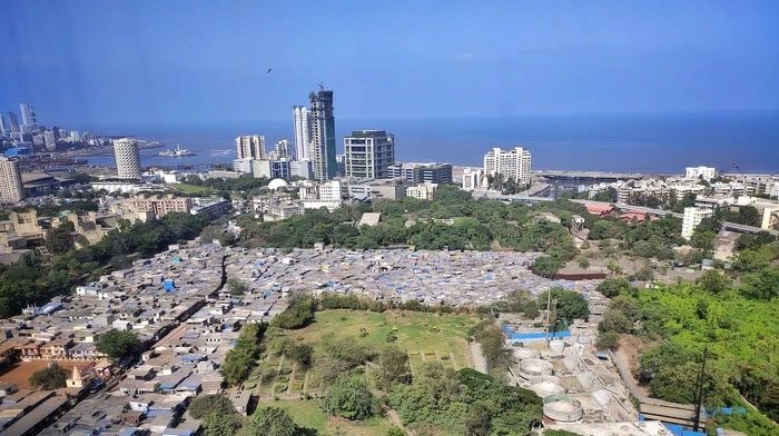 Slums at the foot of skyscrapers in Mumbai