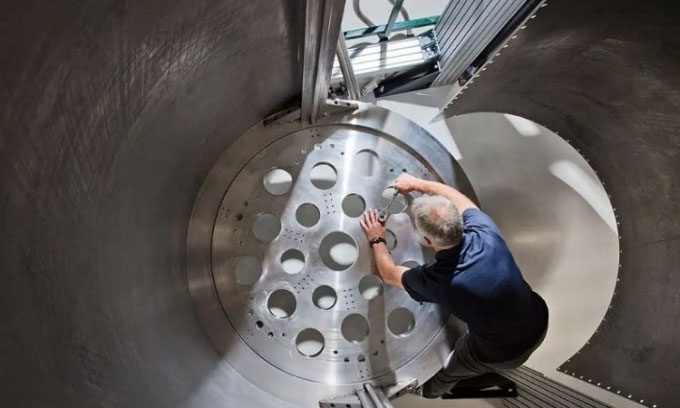 IBM engineers working on the Goldeneye refrigerator project.