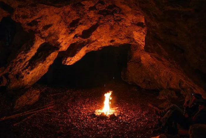Campfire in a cave.