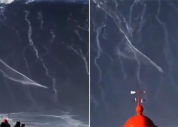man sets record by swimming across 35 meter high wave 120012