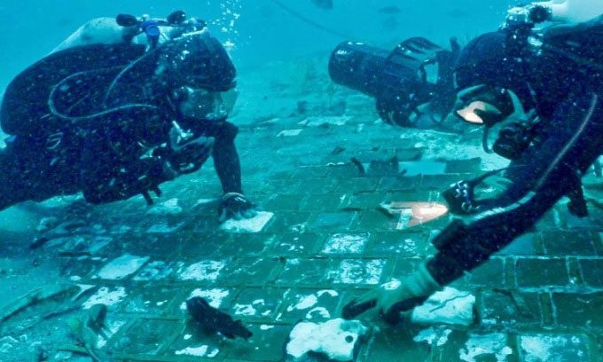 Divers examining the debris of the Challenger shuttle.