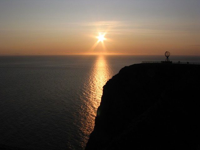 The sun at midnight in summer in Norway.