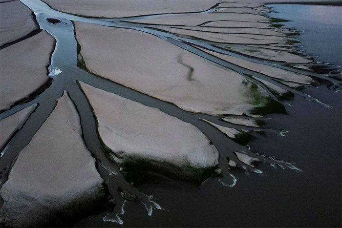 Poyang Lake (China) has reached a record low water level recently.