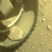 nasas perseverance robot encounters mars rock in wheel 119376
