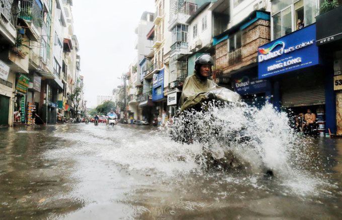 Flooding point on Nguyễn Khuyến Street in July 2019, before the underground reservoir was built.