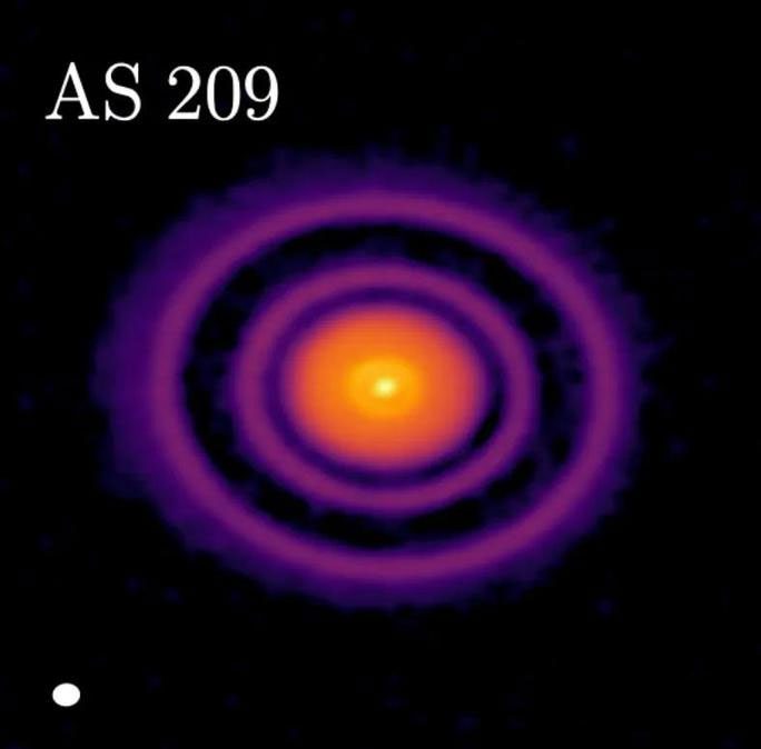 The star with its intact protoplanetary disk - the purple gas and dust rings - AS 209